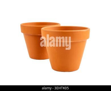 Empty terracotta flower pots, clay garden vase, brown ceramic plant container, terra cotta flowerpot, garden pottery earthenware on white background Stock Photo