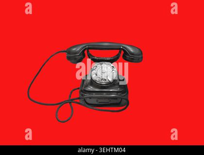 red landline telephone, isolated on free background. Stock Photo