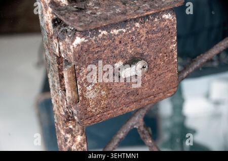 Old  rusty gate lock Stock Photo