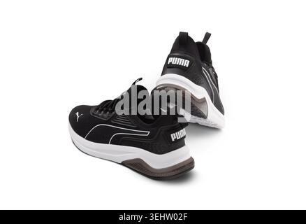 Chisinau, Moldova - August 14, 2025: Studio shot of Puma sneakers isolated on white background, showcasing modern athletic footwear design Stock Photo