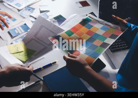 UXUI design brainstorming session with sketches and digital tools Stock Photo