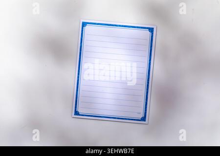 Blank lined notepad on white background Stock Photo