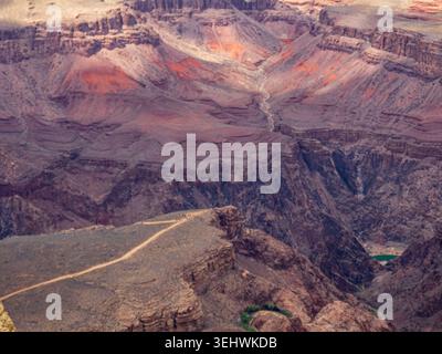 Grand Canyon, May 12, 2026 A view to a flat mesa or butte in the Canyon with the Colorado River visible on the right and layered multi-colored rock. Stock Photo