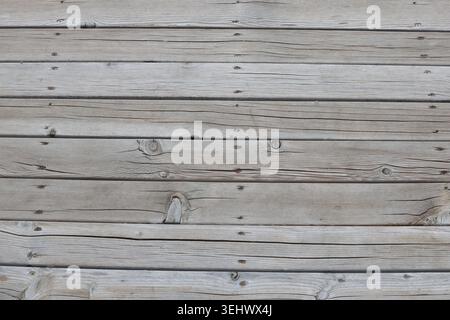Weathered Gray Wooden Planks Texture with Knots and Nails Stock Photo