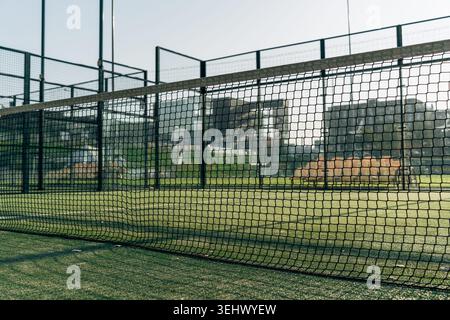 Close Up of Padel Tennis Net Texture on Outdoor Green Court Stock Photo
