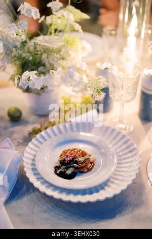 Delicate Setting Elegant Table Setting Featuring a Crystal Decanter with Molasses Stock ...