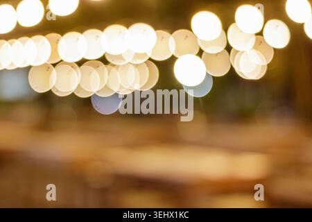 Blurred Warm Bokeh Lights Background. Blurred Background. Bokeh Concept. Golden Lights. High quality photo Stock Photo