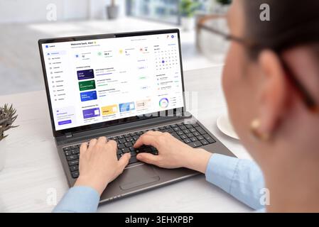 Online learning dashboard displayed on laptop during remote study session, featuring digital courses, productivity widgets and educational analytics i Stock Photo