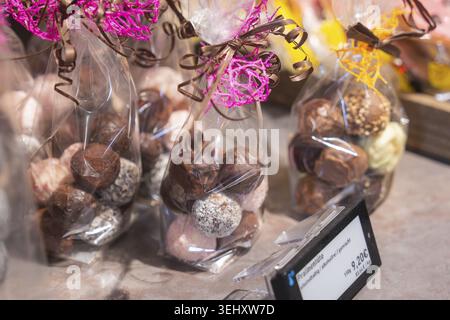 Various chocolates presented in gift boxes with colorful bows, Cafe Kuh, Deckenpfronn, Germany Stock Photo