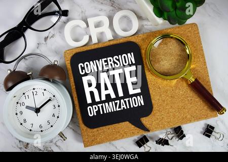 CRO - Conversion Rate Optimization acronym with alarm clock and magnifying glass, business concept background Stock Photo