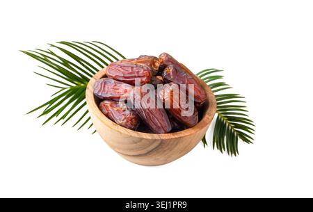 Fresh Dates Palm Fruit in a Wooden Bowl Isolated on White Background - Ramadan date fruit Stock Photo
