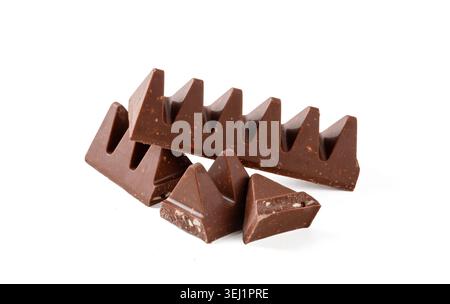 Iconic Triangular Swiss Milk Chocolate Pieces Isolated on White Background Stock Photo