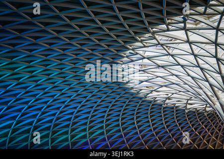 Abstract Modern Architectural Roof Pattern with Blue Lighting Stock Photo