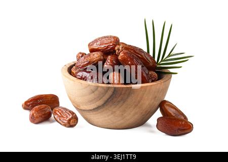 Fresh Dates Palm Fruit in a Wooden Bowl Isolated on White Background - Ramadan date fruit Stock Photo