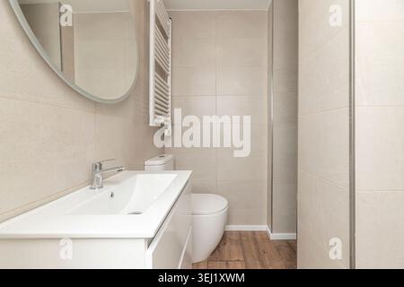 Technology and design come together in this vanity with integrated LED lighting in the base, creating a weightless effect and enhancing the texture of Stock Photo