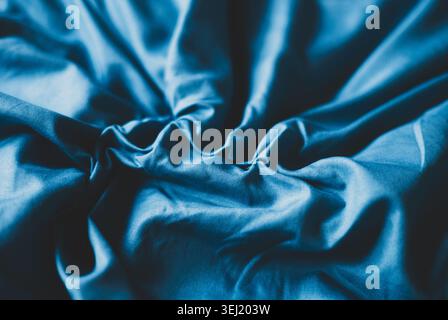 Background of crumpled blue fabric Stock Photo