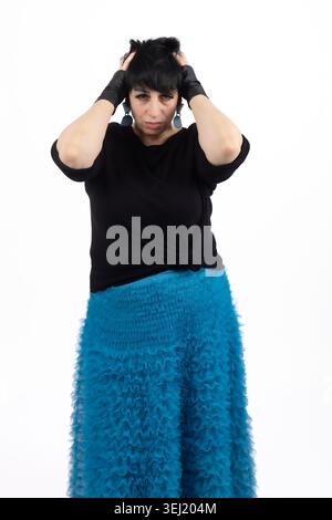 Young woman holding her head in stress or headache Stock Photo