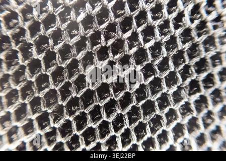 Close up of a metallic honeycomb texture surface Stock Photo