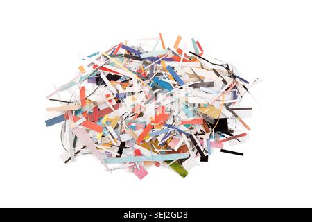 Scraps of colorful paper from magazines and newspapers isolated on white background Stock Photo