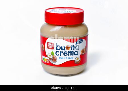 Germany, May 27th 2026: Jar of REWE Beste Wahl Buona Crema milk and hazelnut spread on white background. Sweet chocolate nut cream for breakfast and i Stock Photo