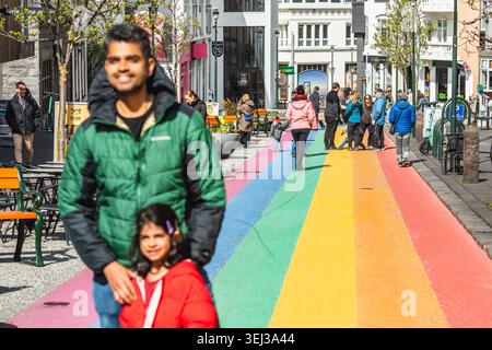 Skólavörðustígur street in Reykjavik, Iceland, famously known as "Rainbow Street" due to its painted pedestrian walk Stock Photo