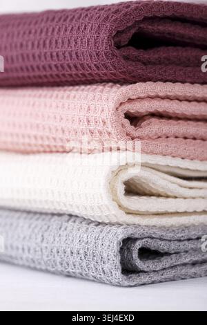 Stack of colorful cotton kitchen towels vertical Stock Photo