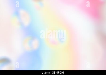 Soft pastel abstract illustration background with blurred rainbow glow, delicate color spots, bright airy composition, copy space. Stock Photo