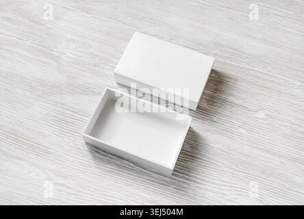 Blank white opened box on light wood table background Stock Photo