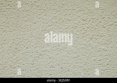 Light beige stucco wall texture, close-up. Stock Photo