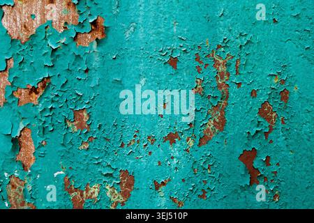 Peeling Turquoise Paint on Rusted Metal Surface Texture Stock Photo