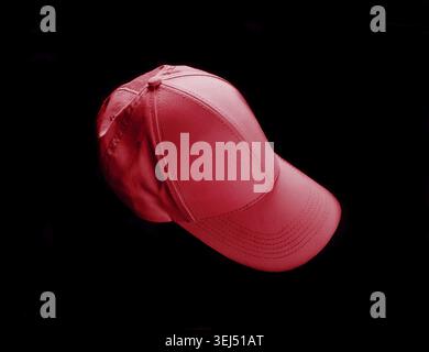 Red baseball cap on black background. Template for placing your design Stock Photo