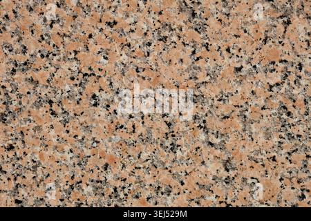 Polished Pink and Black Granite Stone Texture Stock Photo