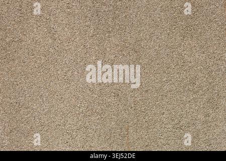 Fine Beige Pebbled Plaster Wall Texture Stock Photo