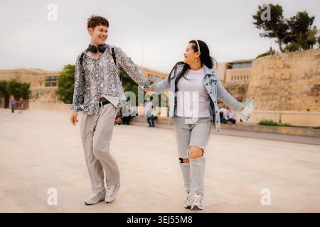 Couple of caucasian tourists having fun Stock Photo