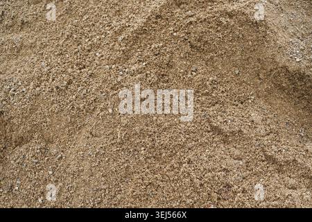 Coarse sand background texture. Closeup of coarse sand grains Stock Photo