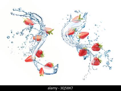 Fresh strawberries and water splashes in air on white background Stock Photo