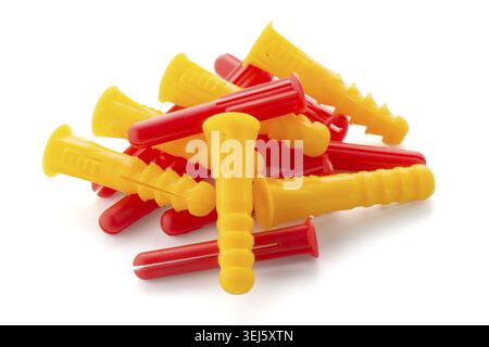 Closeup of colorful plastic dowels isolated on white background Stock Photo