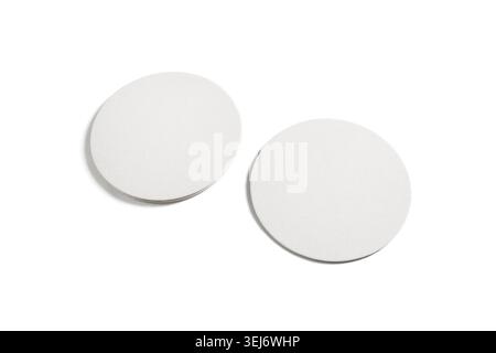 Two blank beer coasters isolated on white background. Clipping path Stock Photo