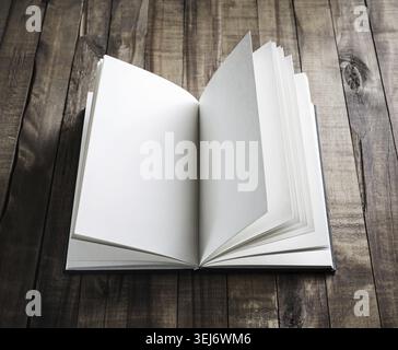 Photo of blank opened book on wooden surface Stock Photo