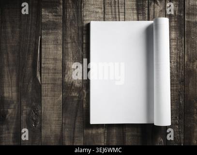 Photo of blank magazine page or catalog on wooden surface. Responsive design mockup. Flat lay Stock Photo