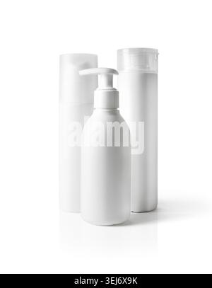 Blank white cosmetic containers isolated on white background. Dispenser, lotion and shaving gel. Clipping path Stock Photo