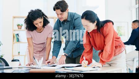 Documents, meeting and discussion with team for business strategy, briefing or schedule in office. Group, employees or creative people with paperwork Stock Photo