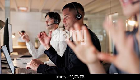 Call center, night and business people on computer in office for contact us, consulting and advice. Talking, working late and workers on pc with Stock Photo