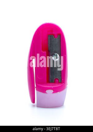 Pink pencil sharpener on a white background for school and office use Stock Photo