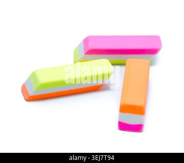Colorful erasers arranged on a white background in a simple design Stock Photo