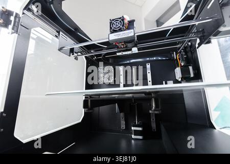 3D printer view of internal components with no filament in the workspace Stock Photo