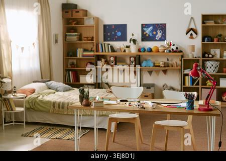 Kids Bedroom Interior Featuring Space Themed Decor Stock Photo