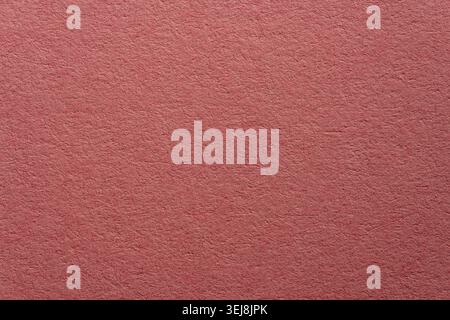 Macro shot of pink craft paper or recycled cardboard texture. High quality abstract background for stationery scrapbooking and eco friendly branding d Stock Photo