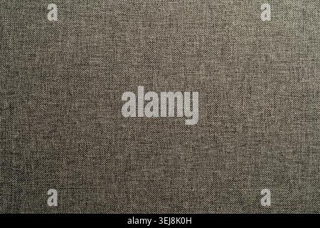 Close up of textured grey brown or taupe upholstery fabric. High quality seamless style textile background for interior furniture design and fashion c Stock Photo
