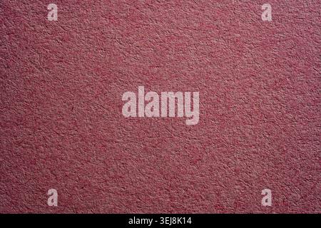 Close up view of rough magenta paper texture. Abstract background for design, greeting cards, and commercial packaging Stock Photo